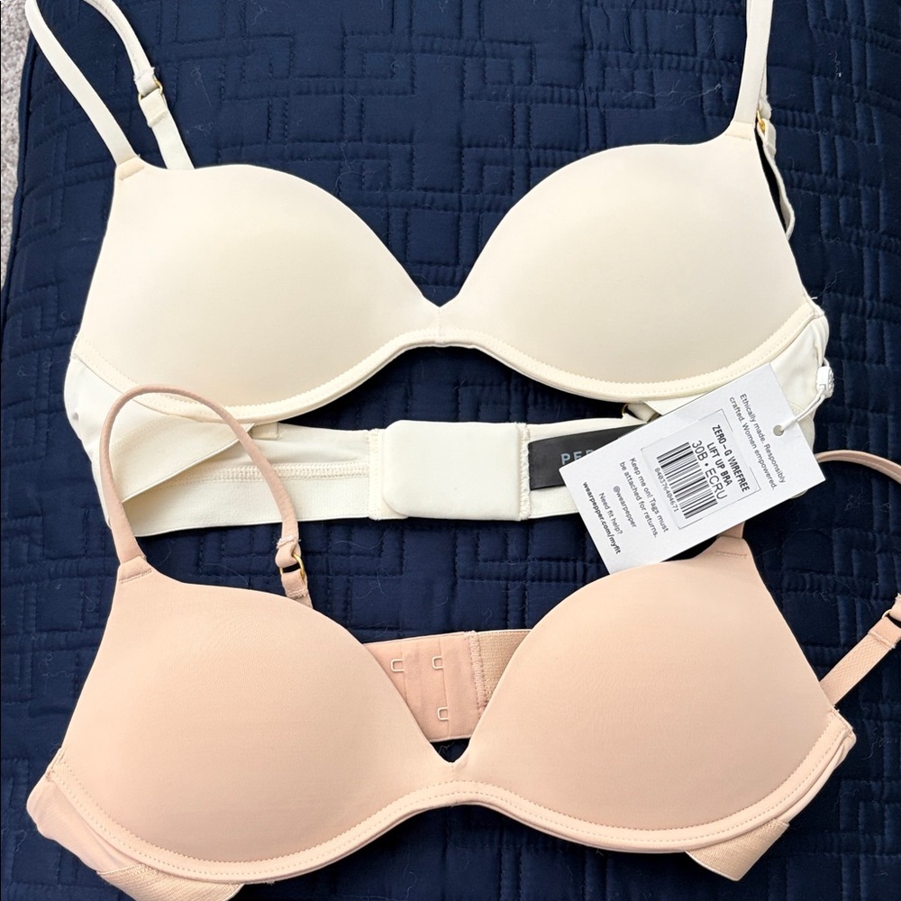2 Pepper Zero G push up non wired bras in ivory and nude.
